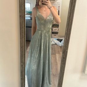 Beautiful silver sparkly prom dress.